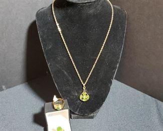 https://ctbids.com/#!/description/share/721056 Pair of 2 genuine jade 14KT gold plated rings. Larger green stone ring is a size 8, the smaller stone ring is a size 6. Chain length 18", pendant 1" Authenticity of metals and stones in necklace and pendant unknown.