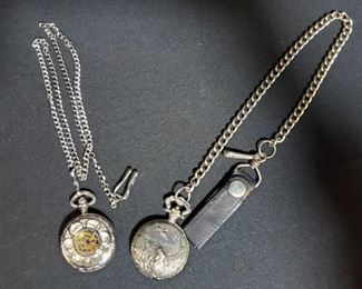 https://ctbids.com/#!/description/share/721057 Pair of silver pocket watches. Milan Japan movement silver pocket watch has a hunting dog looking at a duck and flowers on back. Weight 3.8oz, chain length 22" from leather strap to end of watch, watch measures 1.75".
Singapore movement watch has a skeleton window on front and back. Measures 29.5" from end to end, watch is 1.75" and weighs 2.6oz.
Neither watch is working at the moment.