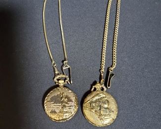 https://ctbids.com/#!/description/share/721124 Pair of gold pocket watches. No movements from either watch. Locomotive watch 2.7oz 16.5" from end to end and watch is 1.75". Numbered Limited Edition Commemorative Statue of Liberty 2.7oz. 17" length from end to end and watch is 1.75"
