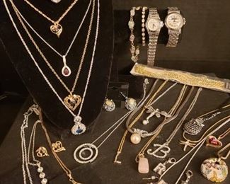 https://ctbids.com/#!/description/share/721127 Large assortment of jewelry and watches. Authenticity of stones and metals unknown.