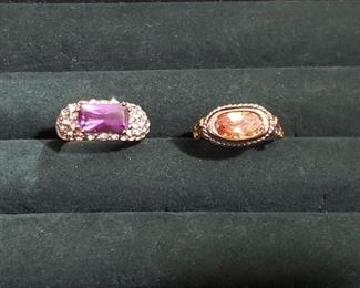 https://ctbids.com/#!/description/share/721126 Two beautiful rings with stones set in an east-west fashion, size 7. The one on the right features horses on the sides. Authenticity of stones and metals unknown.