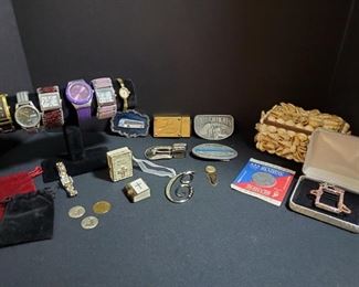 https://ctbids.com/#!/description/share/721129 Collection of women's fashion watches. Timex with Indiglo is still ticking and lights up, the others are not working at the moment. The glass on the Elgin diamond watch is cracked. Lot also includes a seashell jewelry box that measures 7x4x3.5", bible trinket box, mini bible, silver belt buckles and few other treasures.