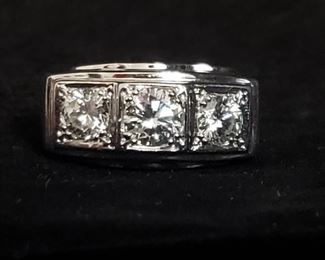 https://ctbids.com/#!/description/share/721135 **There is a reserve of $2,500 for this ring. If the ring does not meet the reserve price, the owner will consider the highest bid but is not obligated to accept it.**
Men's three stone diamond ring with diamonds totaling approximately 1.75 carats set in a 14k white gold band. Size 12. The clarity is I1 and the color is H-J. Approximate retail value is $4,500. The sides of the band have a brushed texture that tapers to a smooth surface on the bottom portion of the ring. Absolutely stunning! The information on the diamonds and value was provided by a gemologist at Windsor Jewelers in Augusta, GA. See photos for measurements. **By bidding on this item, you are agreeing to purchase it if you have the highest bid. Do NOT bid on any item if you do not intend to complete the purchase.**
