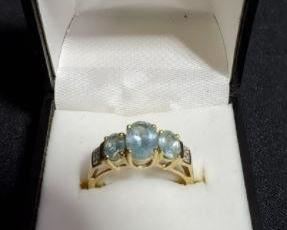 https://ctbids.com/#!/description/share/721119 14K gold ring with three aquamarine stones and diamond accents on the side, size 7. Center stone 1.5cm Diamonds tested using HDE Diamond Selector II tester. Authenticity of aquamarine unknown. *Ring box not included