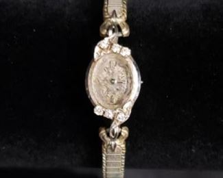 https://ctbids.com/#!/description/share/726837 This vintage Bulova watch is quite a treasure! It is 14k gold with 6 authentic diamonds and faceted glass. Diamonds were tested with the HDE Diamond Selector II diamond tester. It appears to have its original band. Only markings visible on band is USA. See all photos for condition.