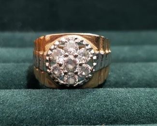 https://ctbids.com/#!/description/share/724061 Just Added! Seven Stone Two-Tone Gentleman's Ring. Men's ring in a size 12. No markings were noted and it does not test as real diamonds. However, it's a really nice looking ring.
