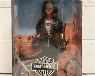 Barbie collectible Harley Davidson Edition. Packaging is damaged but doll is in good condition