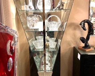 Triangle chrome and glass lighted cabinets.  Too cool!