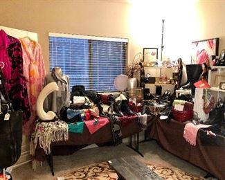 Part of our lady's boutique!  So many purses, scarves-including cashmere, and shoes galore!  More clothes in the closet.  Beautiful round rug.