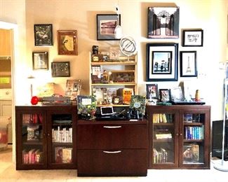 Our office wall with well constructed glass cabinets by HON and Kimball filing cabinet.  Fun mostly fiction books, some gardening, travel, design.  Notice the Russian nesting doll.  She loved going to Paris.