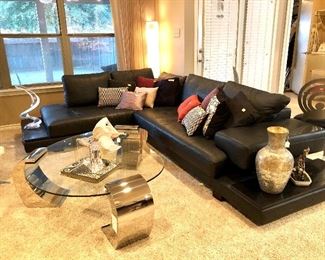 Large leather sectional with 2 end tables connected.  Like new!  Jamie Young large mercury glass vase.