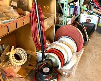 floor cleaner/polisher with changeable pads.