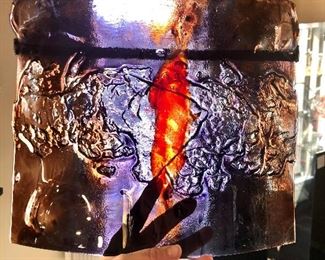 Art glass.  She bought from art galleries.