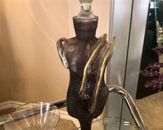 Swanky describes this purple art glass decanter in the shape of a woman.  