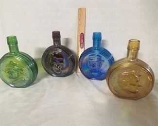 Presidential flasks. These carnival glass flasks show presidents. These four are FDR, Ike, Wilson and Lincoln. They are marked on the bottom “WHEATON N. J. FIRST EDITION". The reverse of Wilson’s states his points for the League of Nations. The others have famous quotes.