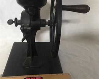 Grain mill. The mill is old but has been mounted on a new board.