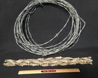 Barbed wire. Small coil of modern barbed wire and 10 18inch pieces of antique wire that has been identified as Buckthorn Ribbon.