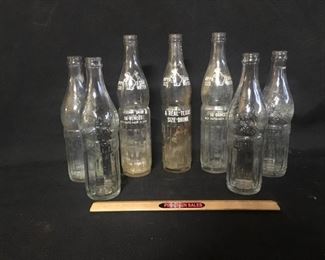 Bottles. Seven “HIPPO SIZE SODA WATER" bottles.
Three are 16 oz. and four are 13 oz.
