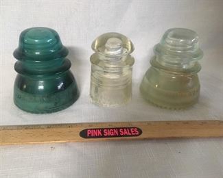 Insulators. The two larger ones are Hemingway-42 and are both damaged. See pictures for details. The smaller one is Pyrex which is also chipped.