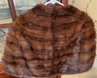#48 - $185 - Adorable brown mink cape - size 6 approx. liner is made of brown velvet. Very good condition. 