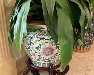 #34 $75 Oriental pot with faux plant and wood base 