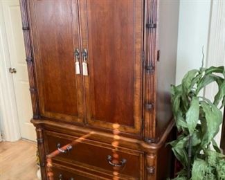#72 - $195 Bamboo style armoire with shelve 39 1/2" W x 19 1/2"D x 73"T