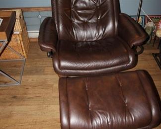 $250. Stressless, push back "Ekornes" leather recliner and footstool.