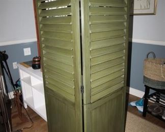 $75. Trifold green wooden screen, opens to a width of 66 inches and 72 inches tall. 
