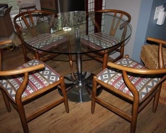 $150. Chrome base pedestal table with 39" diameter top.                                                                                                                         $200.  Set of 4 dining chairs.