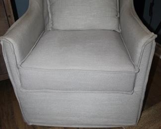 $50. Swivel arm chair, beige colored fabric.