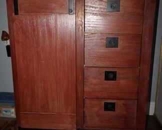 $175. Four drawer with sliding barn door cabinet and shelves.