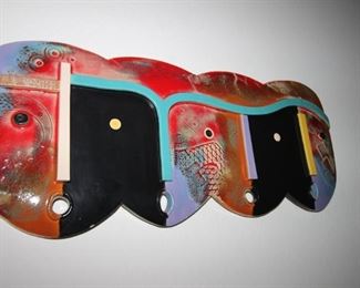 $45. Dominique, four masks ceramic wall art.