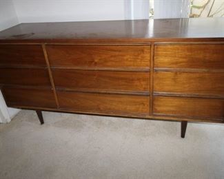 $200. Dixie nine drawer chest, top has a little damage.