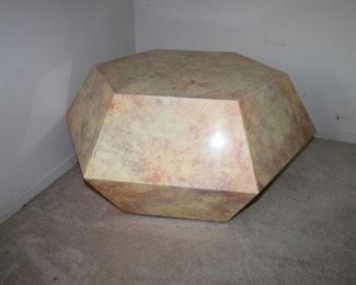 $100. Faux marble, six sided coffee table,