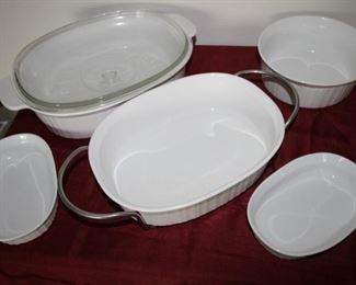 $25. Assortment of white Corning Ware serving dishes. 