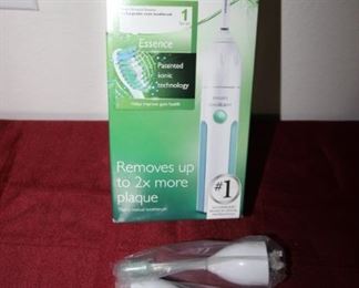$20. Philips Sonicare NIB electric toothbrush with extra heads.