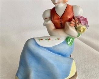 $25.  Lovely HEREND figurine of seated woman with bouquet of flowers. Mint condition. 3 5/8” tall x 3” wide