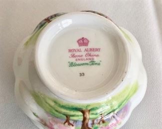 $25.   Royal Albert mark for creamer, sugar, tray