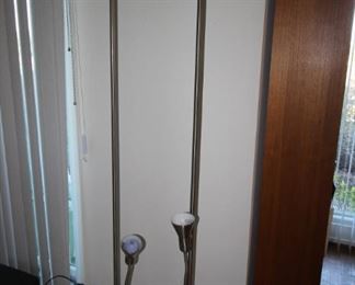 $40 each. Two matching floor lamps with height adjustable reading light.