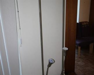 $40 each. Two matching floor lamps with height adjustable reading light.