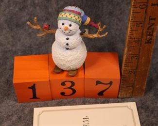 137:  Winter fun. Now $6.  Was $8.  Lenox snowman by Lynn Bywaters - 1990s.  New in box - excellent condition.  