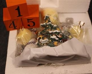 145:  Together at Christmas. Now $25.  Was $50.  Still sealed (we did not unseal or unwrap other than to get the bagged pics.  The next pic was taken off the internet to show the item. Lenox snowman by Lynn Bywaters - 1990s.  New in box - excellent condition.  