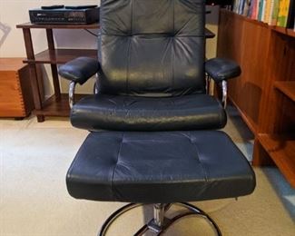 Ekornes, stressless lounger and ottoman . Navy blue leather , chrome steel base . Made in Norway 