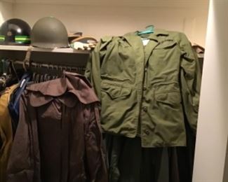 Army and air force uniforms and army jackets . Helmets and hats (female)