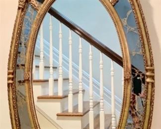 22. Oval Mirror w/ Ornate Smoked Mirror and Gilt Frame (28" x 53")