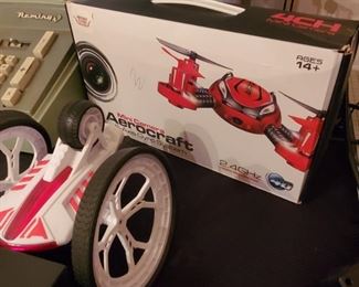 Several remote controls and drones