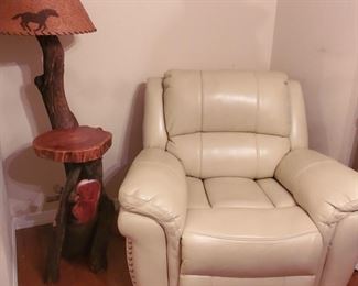 SUER COMFY cream colored recliner  and cool driftwood floor table with horse shade (leather bound)