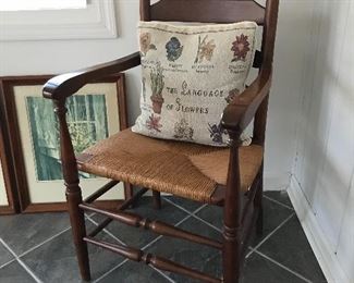 Antique ladder back chair with rush seat