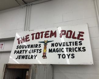 Large totem pole souvenir sign