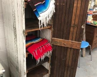 Distressed wood storage cabinet